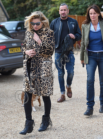 Kate Moss wearing Burberry Prorsum leopard print rabbit fur coat