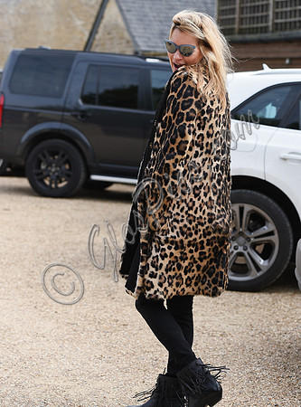 Kate Moss wearing Burberry Prorsum leopard print rabbit fur coat