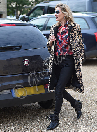 Kate Moss wearing Burberry Prorsum leopard print rabbit fur coat