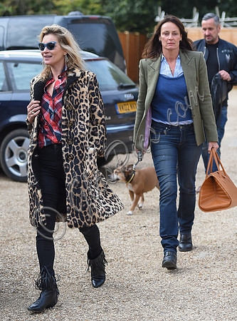 Kate Moss wearing Burberry Prorsum leopard print rabbit fur coat