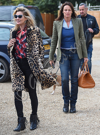 Kate Moss wearing Burberry Prorsum leopard print rabbit fur coat