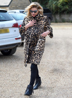 Kate Moss wearing Burberry Prorsum leopard print rabbit fur coat
