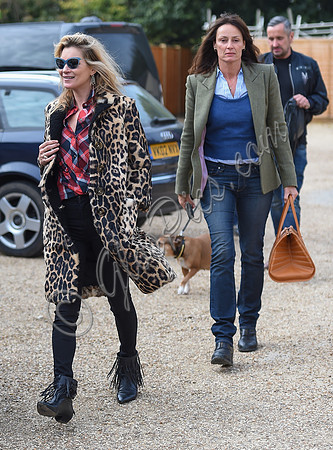 Kate Moss wearing Burberry Prorsum leopard print rabbit fur coat
