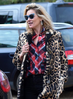 Kate Moss wearing Burberry Prorsum leopard print rabbit fur coat