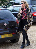 Kate Moss wearing Burberry Prorsum leopard print rabbit fur coat