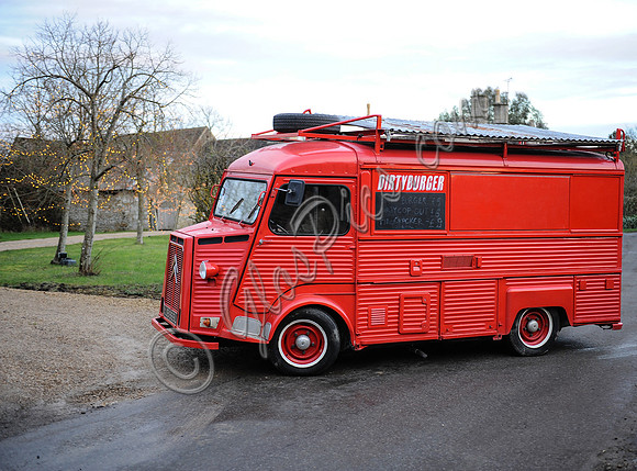 red "Dirty Burger" Citroën H-Van entering Kate Moss's Cotswold home