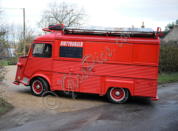 red "Dirty Burger" Citroën H-Van entering Kate Moss's Cotswold home