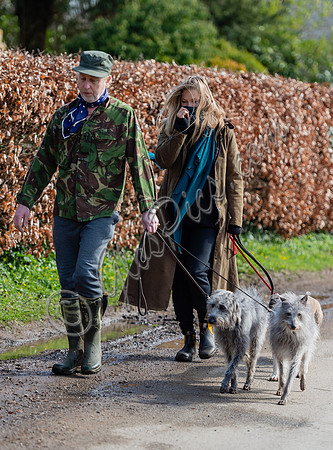Kate Moss and James Brown walking dogs