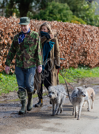 Kate Moss and James Brown walking dogs