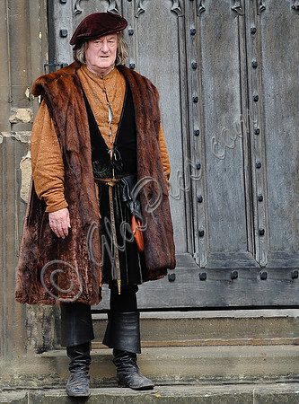 Bernard Hill as the Duke of Norfolk on the steps of Gloucester Cathedral(Wolf Hall)