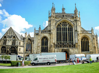 external view of Gloucester cathedral with film trucks in foreground