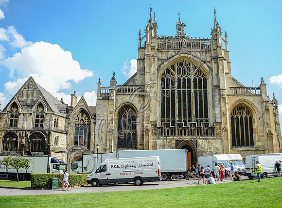 external view of Gloucester cathedral with film trucks in foreground