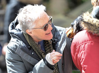 Glenn Close patting long haired daschund
