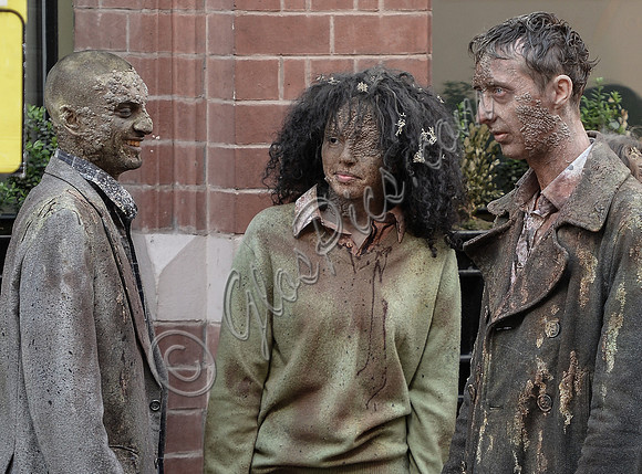 Extras - 'Hungries' on set in full make-up