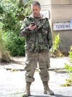 Paddy Considine wearing army fatigues