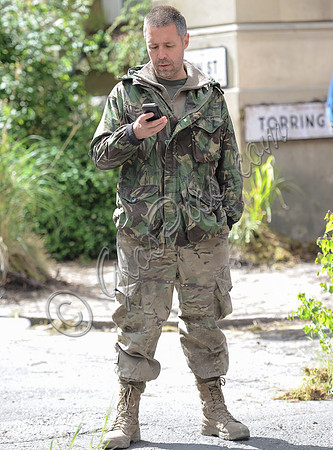 Paddy Considine wearing army fatigues