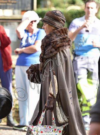 atmosphere, film extras in fur coats on set in Bampton