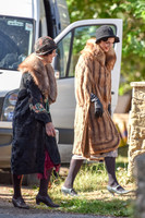 atmosphere, film extras in fur coats on set in Bampton
