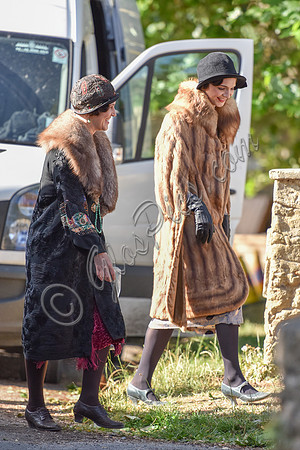 atmosphere, film extras in fur coats on set in Bampton