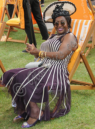 Rosemary Okogwu sitting in Veuve Clicquot deckchair