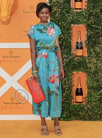 Tolulah Adeyemi wearing turquoise floral silk cullotte suitsil