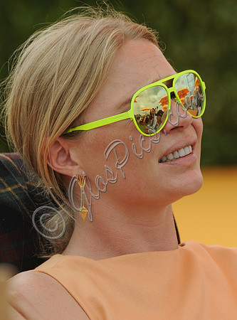 Jodie Kidd tight head shot wearing neon sunglasses