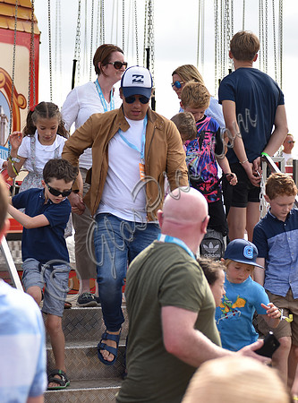 Jamie Oliver with Petal Blossom Rainbow and Buddy Bear Maurice on fairground ride at Big Feastival
