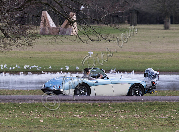 Theo James driving Austin Healey, filming scenes for "The Gentlemen"