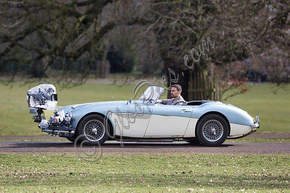 Theo James driving Austin Healey, filming scenes for "The Gentlemen"
