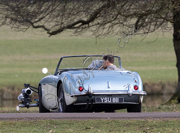 Theo James driving Austin Healey, filming scenes for "The Gentlemen"