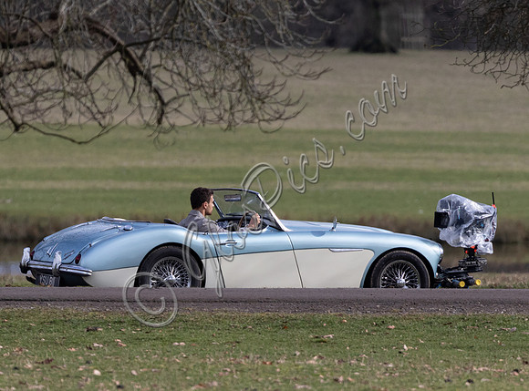 Theo James driving Austin Healey, filming scenes for "The Gentlemen"