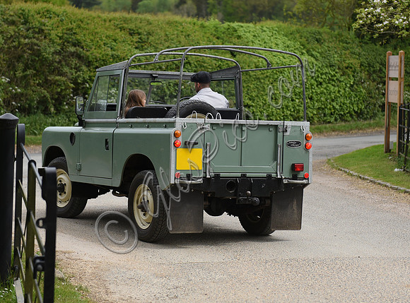David and Harper Beckham in Land Rover pick-up (back view)