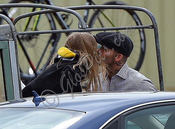 David and Harper Beckham share a kiss