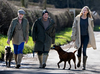 James Brown, David Gardner and Jessica Clarke with dogs