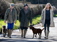 James Brown, David Gardner and Jessica Clarke with dogs