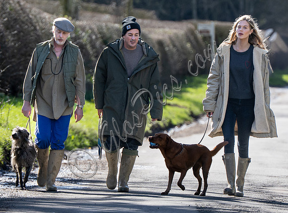 James Brown, David Gardner and Jessica Clarke with dogs