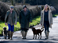 James Brown, David Gardner and Jessica Clarke with dogs