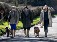 David Gardner and fiancée Jessica Clarke enjoy a springtime walk with close friend James Brown