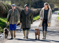James Brown, David Gardner and Jessica Clarke with dogs