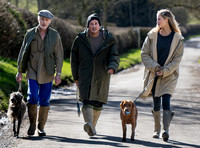 James Brown, David Gardner and Jessica Clarke with dogs