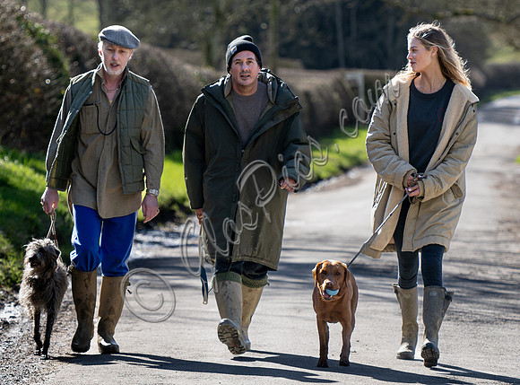 James Brown, David Gardner and Jessica Clarke with dogs