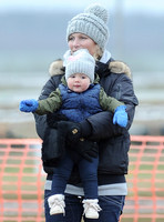 Zara Phillips with daughter wearing matching woolly hats