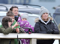 Zara Phillips with daughter held by Dolly Maude wear matching woolly hats