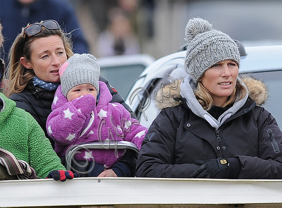 Zara Phillips with daughter held by Dolly Maude wear matching woolly hats