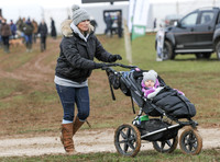 Zara Phillips with Daughter in buggy wearing matching woolly hats