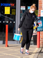 Josie Gibson in black tracksuit and trainers