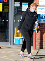 Josie Gibson in black tracksuit and trainers