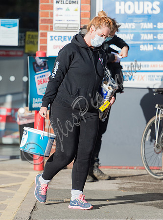 Josie Gibson in black tracksuit and trainers