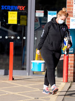 Josie Gibson in black tracksuit and trainers