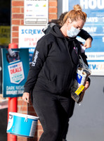 Josie Gibson in black tracksuit and trainers